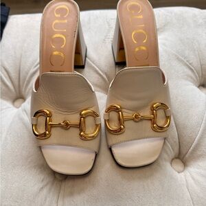 Gucci slide sandal with horsebit. See receipt for authenticity.